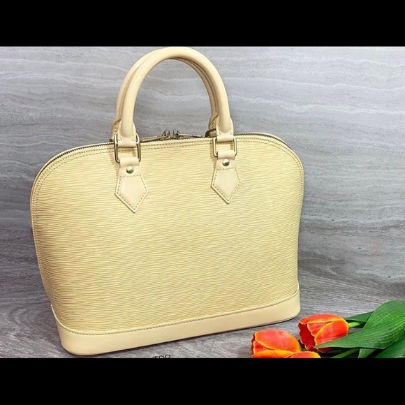 AUTHENTIC LOUIS VUITTON ALMA PM IN EPI (VANILLA) - Picture 10 of 10